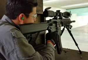 Precision shooting session focusing on firearm safety and handling
