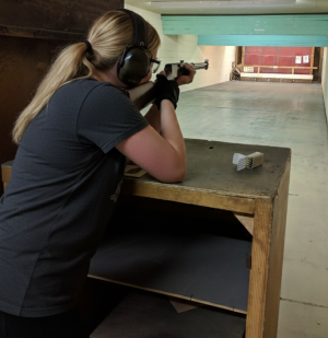 Precision shooting session focusing on firearm safety and handling